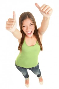 Happy woman giving thumbs up